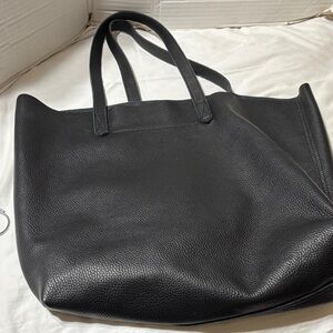 Guyana unlined leather tote with inside zip pocket. Preowned in EUC